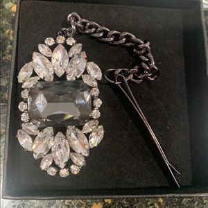 ASOS crystal hair accessory sits on forehead